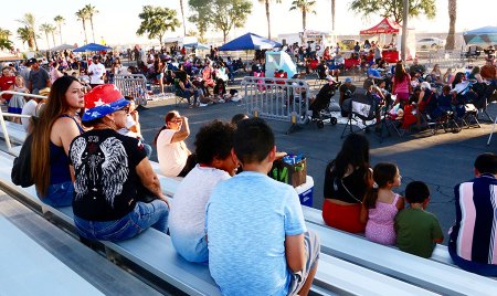 Local folks filled up bleachers quick in anticipation of the fireworks show.